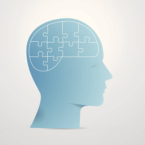 Vector silhouette head with puzzle in the shape of Brain. vector art illustration