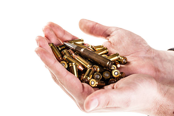 istock Hands full of ammo 467464261
