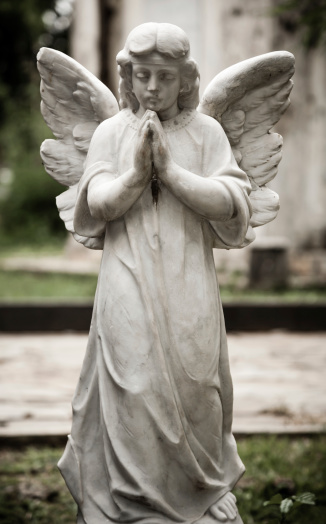 Jakarta,Indonesia - January 11, 2014: Statue of angel in old cemetery Museum Prasasti