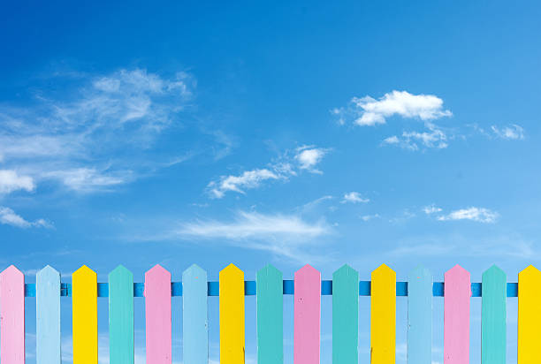 istock Beautiful wooden fence on a blue  sky background. 467474884