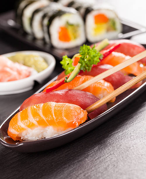 istock Delicious sushi salmon rolls 467478804