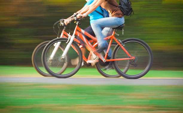 istock Two Women Cycling in the Park 467481593