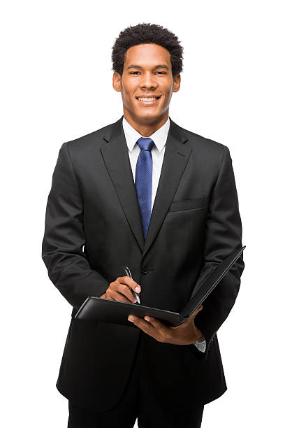 istock Cheerful latin business man writing in black folder 467482081