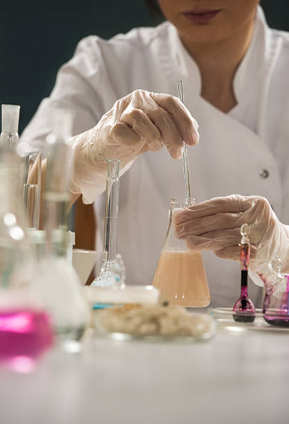 istock Unrecognizable science professional working with the glass cuvette 467486688