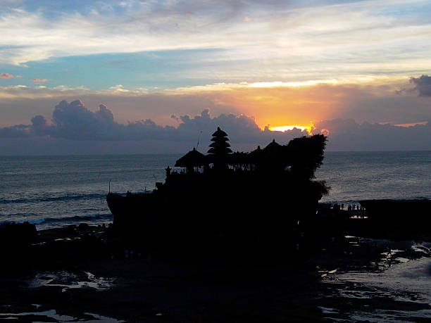 istock sunset at famous temple Tanah Lot 467489218
