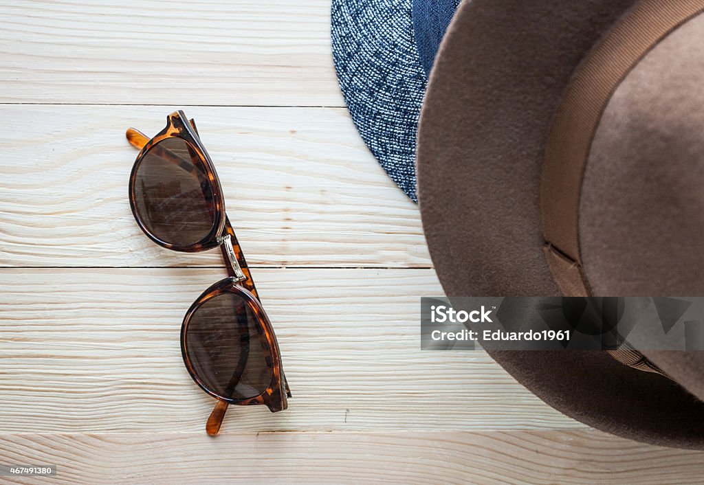 Set of various clothes and accessories for men Set of clothes and various accessories for men on old wooden table 2015 Stock Photo