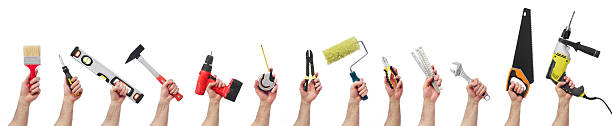 hände holding tools - home improvement hammer saw work tool stock-fotos und bilder