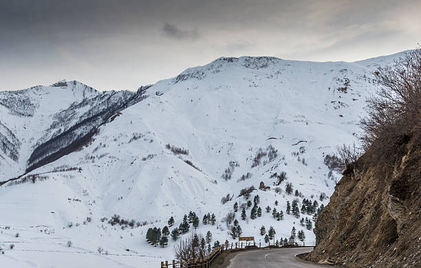 istock Caucasian mountains  and amazing clouds 467496836