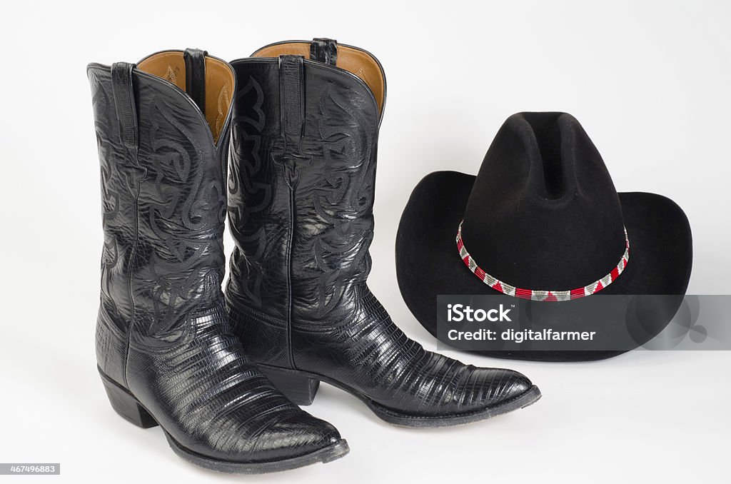 Cowboy Boots with Black Stetson Hat. Black Cowboy Boots with Cowboy Hat. Boot Stock Photo