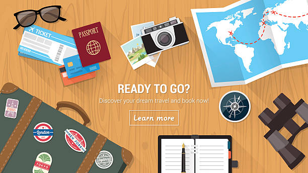 A travel agency as with various travel icons Traveler's desktop with suitcase, camera, plane ticket, passport, compass and binoculars, travel and vacations concept explorer photos stock illustrations