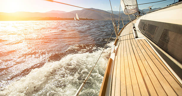 istock Yacht sailing towards the sunset. 467501710