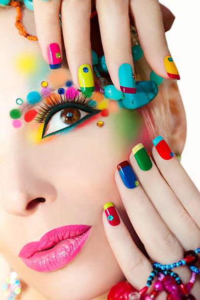 bunte französische maniküre und make-up. - nail polish cosmetics make up multi colored stock-fotos und bilder