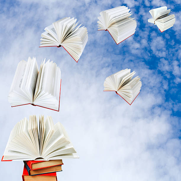 istock books fly out of pile 467506179