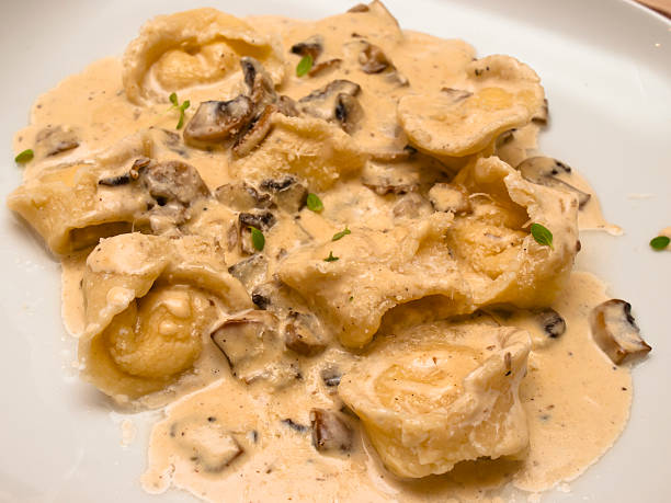 istock Cheese Tortellini with mushroom sauce 467507493