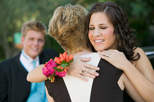 istock Friends Hugging at Prom 467507633