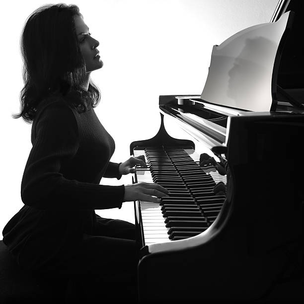 istock Pianist plays grand piano 467509081