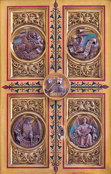 istock Bratislava - Four Evangelists symbols carved on tabernacle 467509533