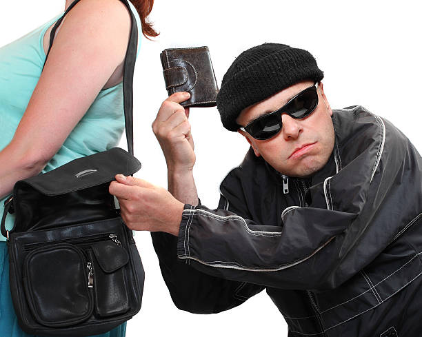 The Crime. Thief stealing from handbag of a woman. Crime and Shopping theme. Insurance concept. pickpocketing stock pictures, royalty-free photos & images
