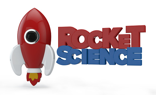 3D render of a symbolic rocket with the text rocket science. The rocket is painted in red and has white wings and red and yellow flames from its thrusters. Near it there is the text Rocket Science written in blue and red color. All elements are isolated on white. 