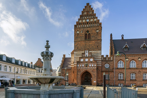 Town hal in Roskilde is 19th century building in Neo-gothic style. The Gothic tower, the only remain of the St. Lawrence church, built in the early 12th century and destroyed during the Reformation.