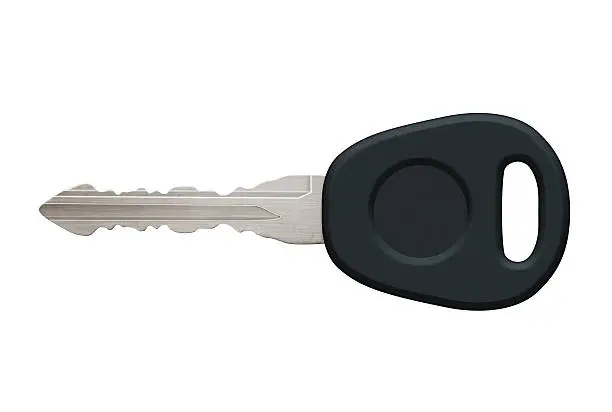 Car or motorbike key with silver shaft and black handle with hole of a key ring. Isolated on a white background with clipping path.