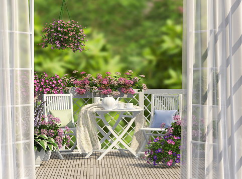 Balcony, white furniture and flowers
