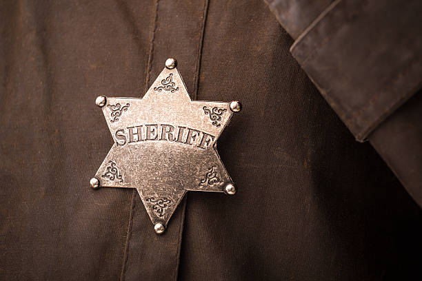 istock Close up of sheriff badge 467511926
