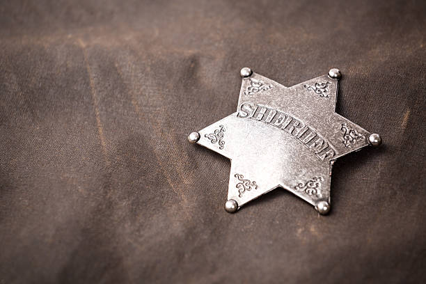 istock Close up of sheriff badge 467512350