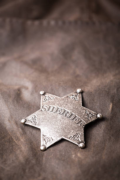istock Close up of sheriff badge 467512352