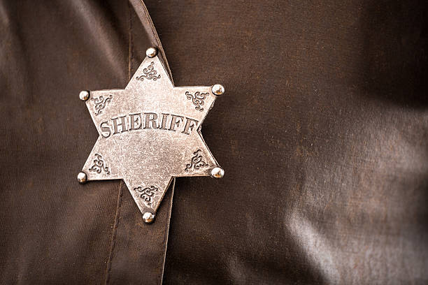 istock Close up of sheriff badge 467512360