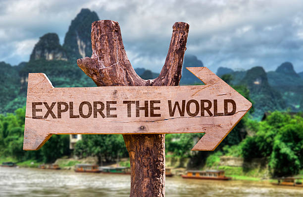 istock Explore the World wooden sign with a forest background 467512614