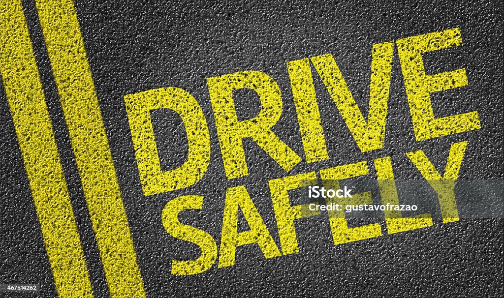 Drive Safely written on the road Safety Stock Photo