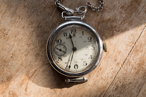 istock Vintage watch on a wooden background. 467517126