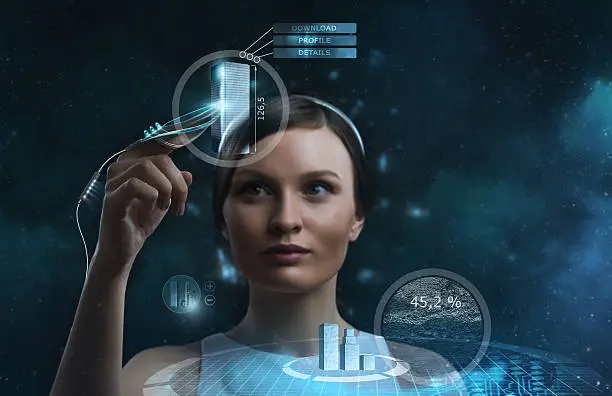 Photo of Futuristic businesswoman working with a transparent screen