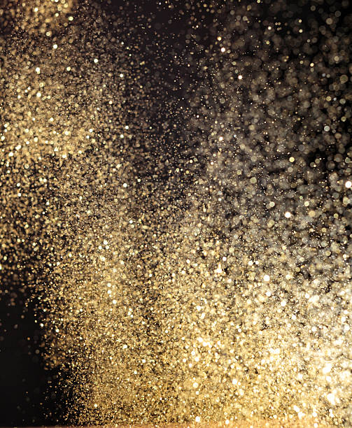 istock Black background with golden rain 467521035