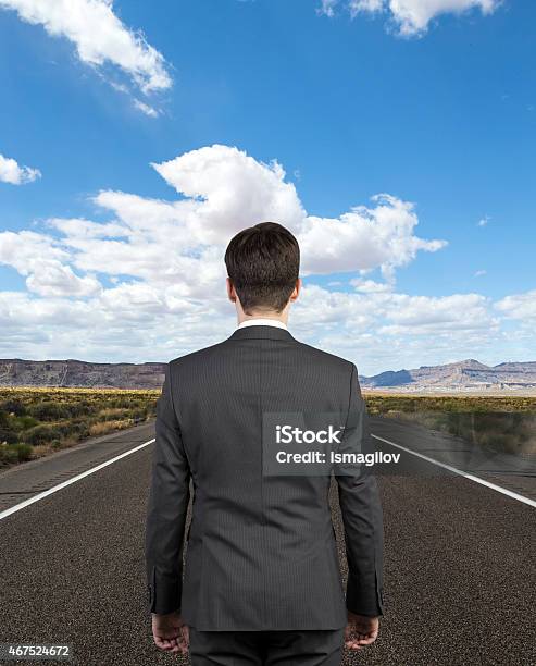 Businessman On Road Stock Photo - Download Image Now - 2015, Adult, Asphalt