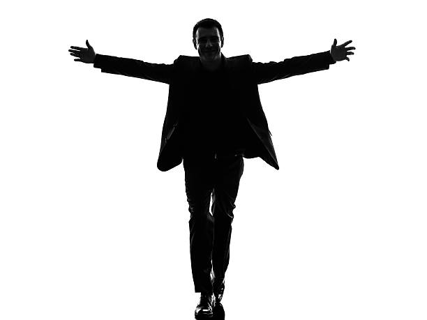 istock business man arms outstretched silhouette 467526492