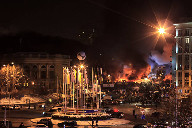 Protesters defend barricades and burn tires on Hrushevskoho Street stock photo