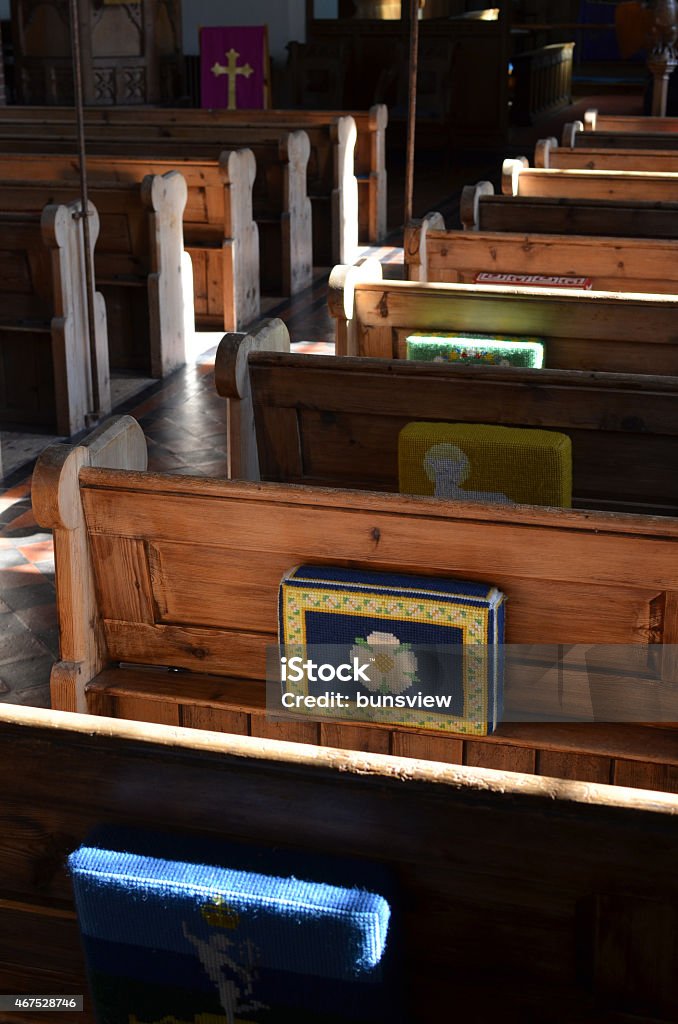 Church pews Traditional wooden  pews in a English church. 2015 Stock Photo