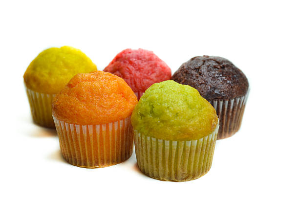 istock tasty muffin cakes, isolated on white 467531788