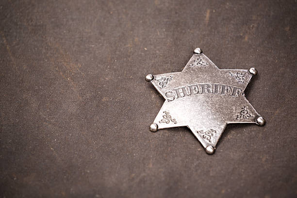 istock Close up of sheriff badge 467532158