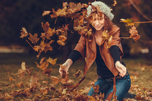 istock girl in autumn park 467532990