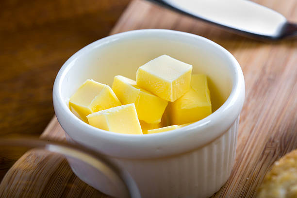 istock fresh yellow dairy butter in a white bowl 467533864
