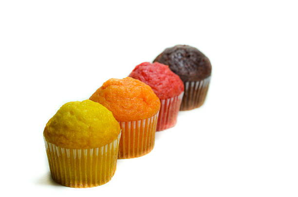 istock tasty muffin cakes, isolated on white 467534366