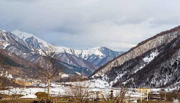 istock Caucasian mountains  and amazing clouds 467534588