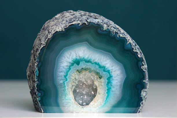 Geode Blue/green agate geode crystal with cut base closeup geode photos stock pictures, royalty-free photos & images