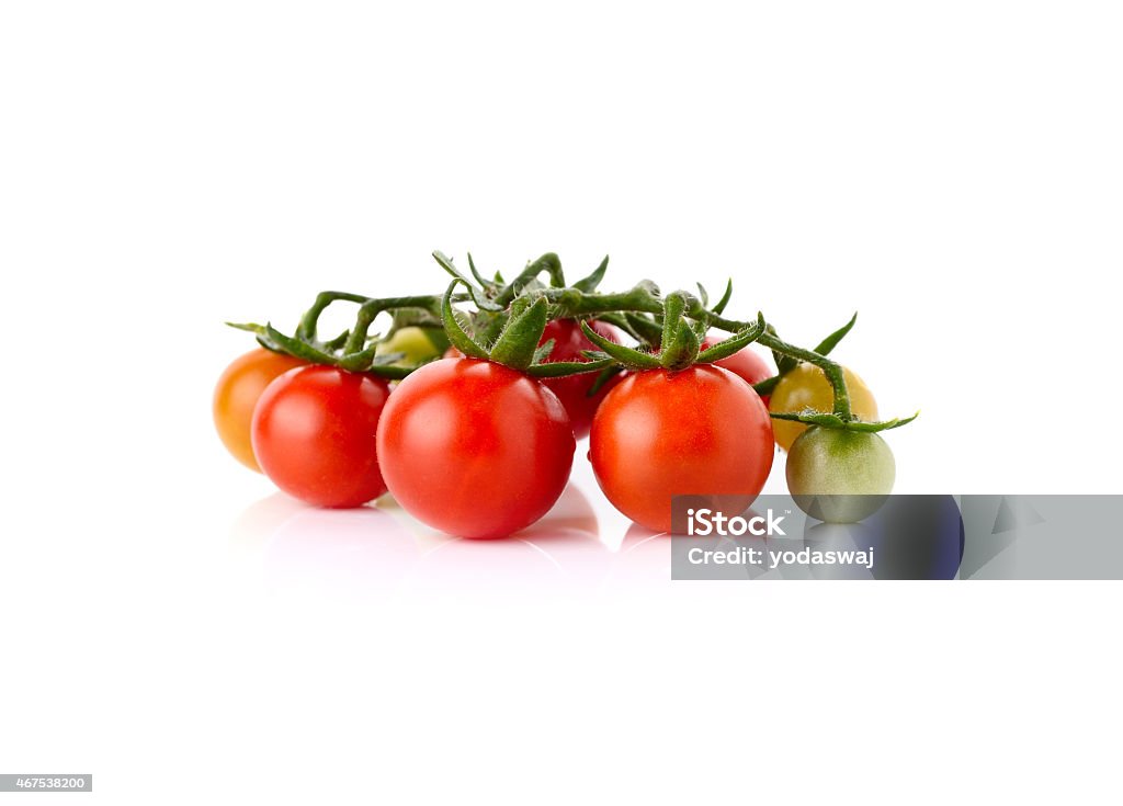 fresh cherry tomatoes with stem isolated on white background 2015 Stock Photo