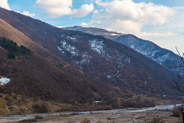 istock Caucasian mountains  and amazing clouds 467538410