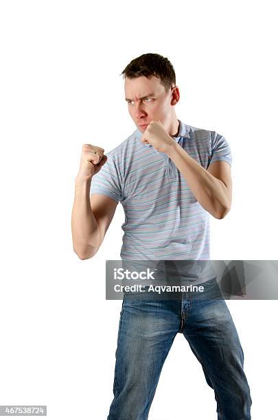 Angry Man Threatens His Fists Stock Photo - Download Image Now - 2015, Adult, Aggression