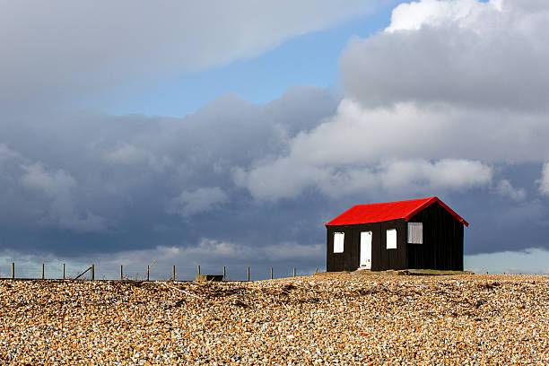 istock Red Roofed Hut at Rye Harbour Nature Reserve 467540152